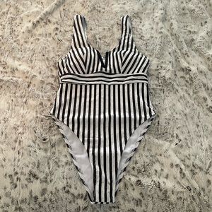 Modest black and white striped one piece high cut